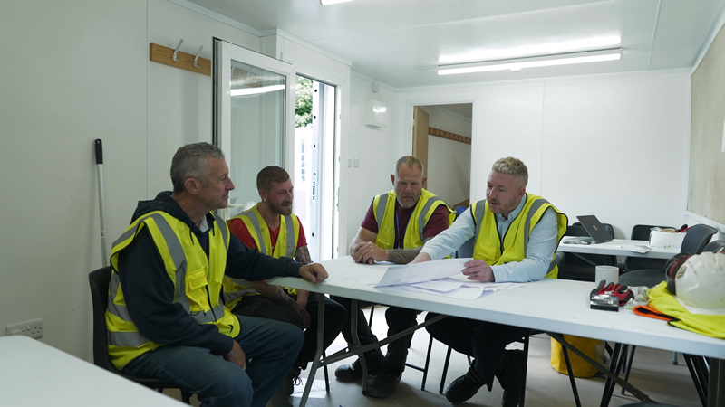 Staff receiving a workplace briefing
